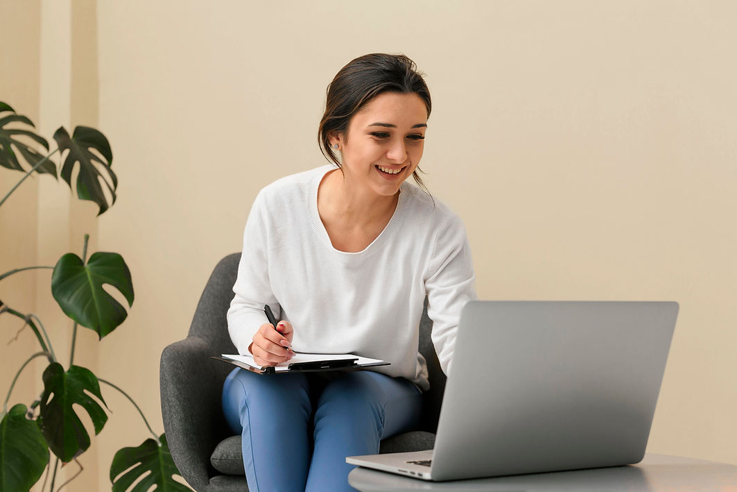 smiley-businesswoman-taking-notes-clipboard.jpg